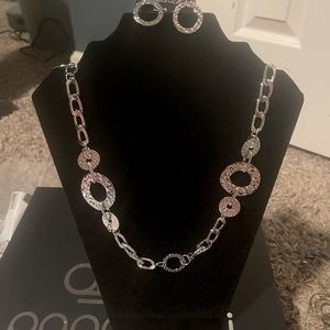 Necklace and earring set one size fits all.